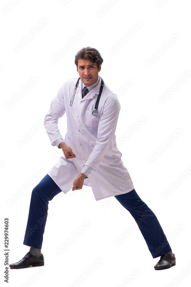 Young handsome doctor under pressure isolated on white Young handsome doctor under pressure isolated on white