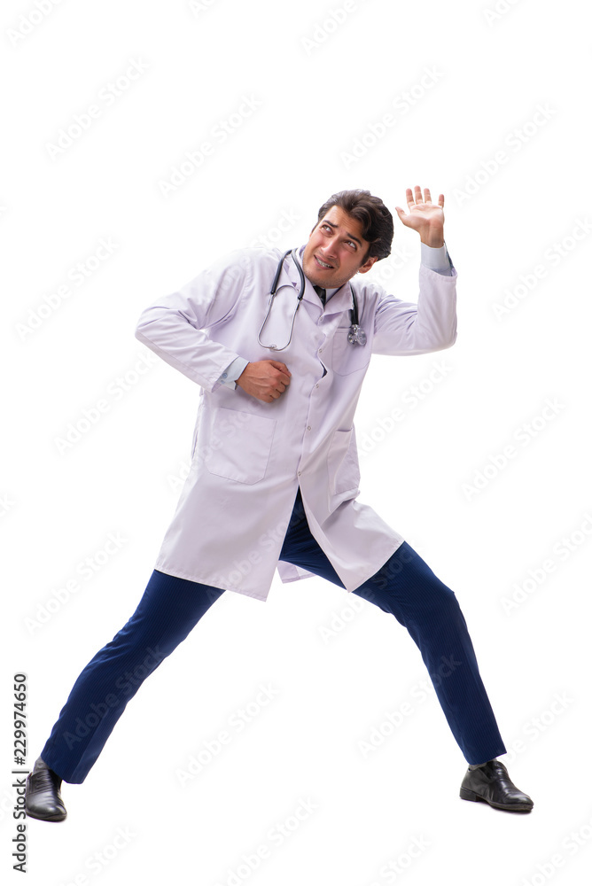 Young handsome doctor under pressure isolated on white Young handsome doctor under pressure isolated on white