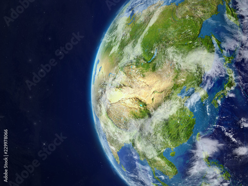 Asia from space on beautiful model of planet Earth with very detailed planet surface and clouds.