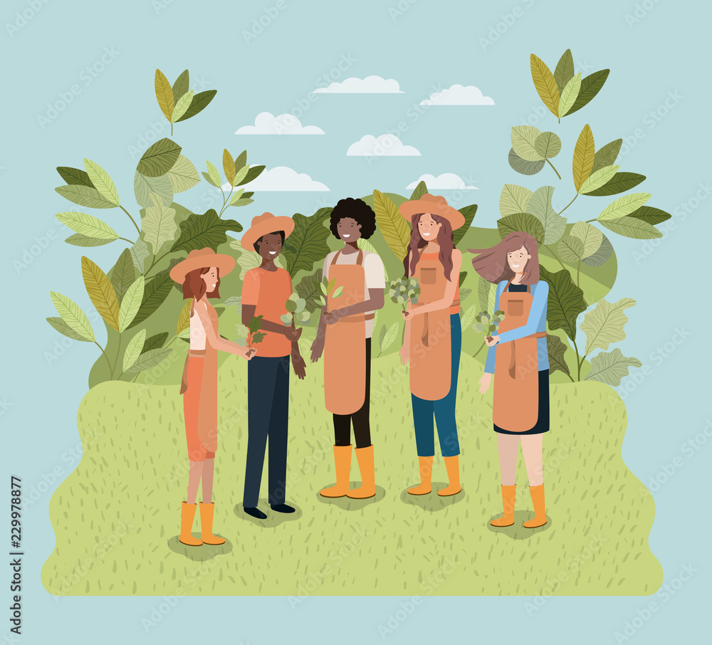 group of women planting trees in the park