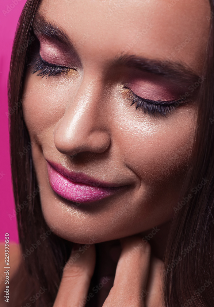 Close up glamour beauty woman portrait. Fashion wet shiny skin, with drops sexy gloss lips make-up and pink eyebrows Close up glamour beauty woman portrait. Fashion wet shiny skin, with drops sexy gloss lips make-up and pink eyebrows