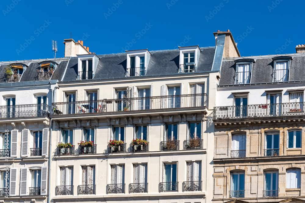 Fototapeta premium Paris, beautiful buildings boulevard des Batignolles, typical parisian facades