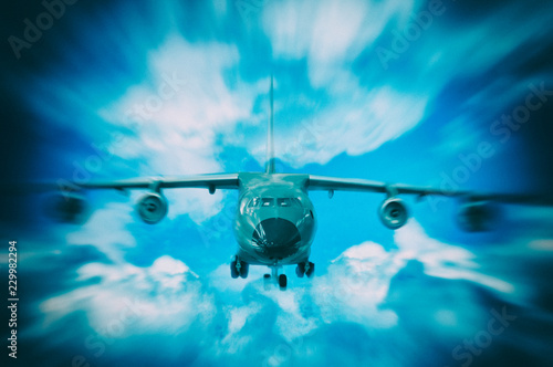 Fototapeta Naklejka Na Ścianę i Meble -  cargo or passenger plane in clouds