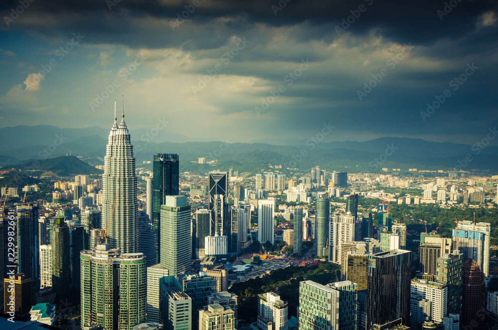 Famous Petronas Twin Towers skyscrapers Kuala Lumpur, Malaysia. Aerial skyline view
