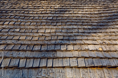 old wooden roof made of small tiles