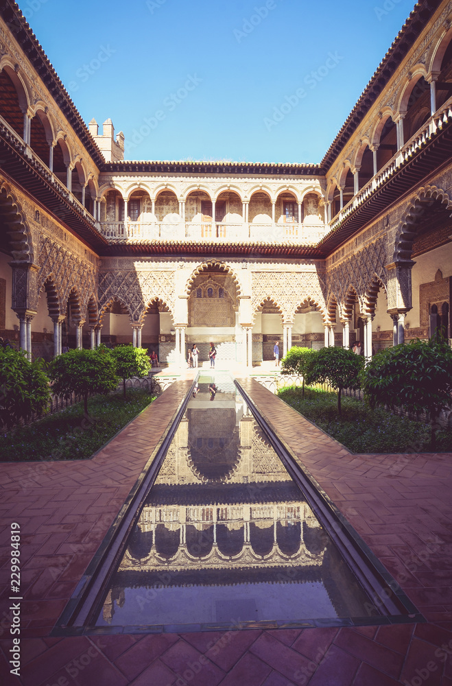 Fototapeta premium The Courtyard of the Maidens in the The Alcazar of Seville