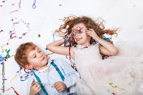 Group of adorable kids having fun at birthday party