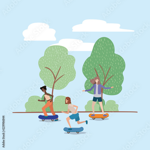 group of young women in skateboard on the park