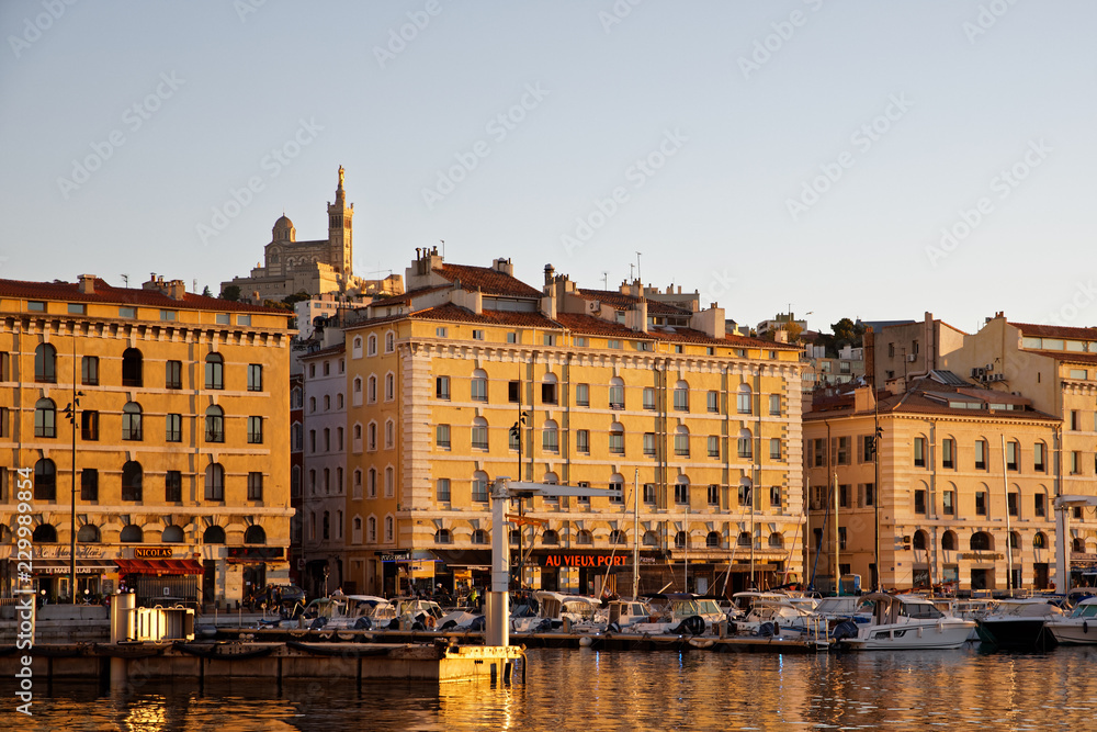 Marseille, France - October 3, 2018: Vieux port Old Port at sunset is one of the most visited places in the city