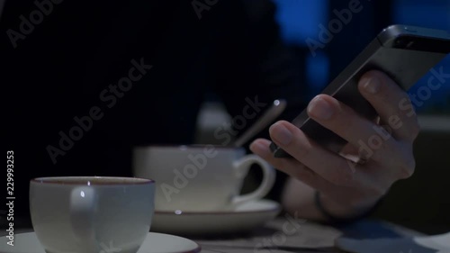 Using Phone with Screen In Cafe.