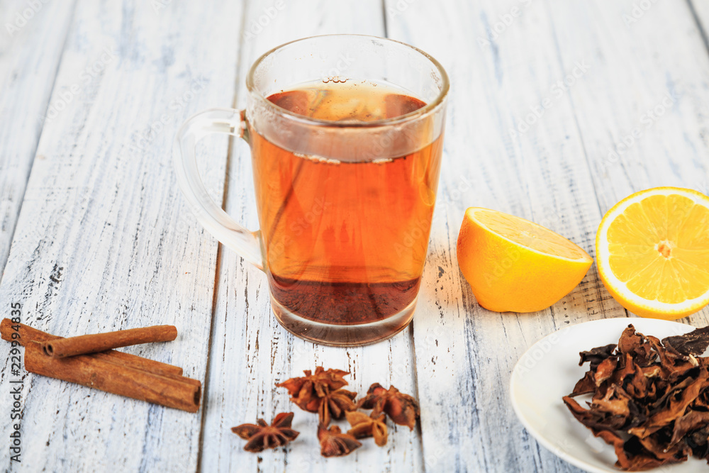 hot tea, cinnamon sticks, star anise and orange hot tea, cinnamon sticks, star anise and orange