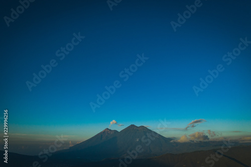 Aerial view of volcanoes Fuego and Acatenango at sunrise in Guatemala