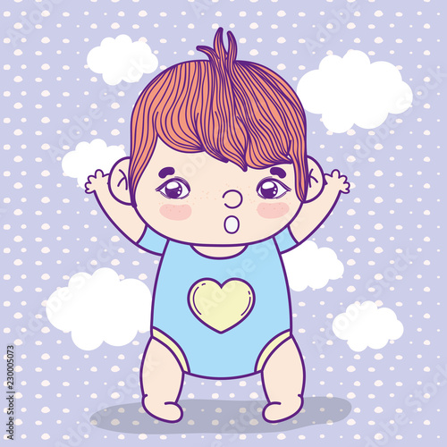 baby boy with pijama over clouds background