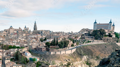 View of the Spanish city of Toledo, seen from the Gothic cathedral of Santa Maria and the alcazar, in a structure of medieval city