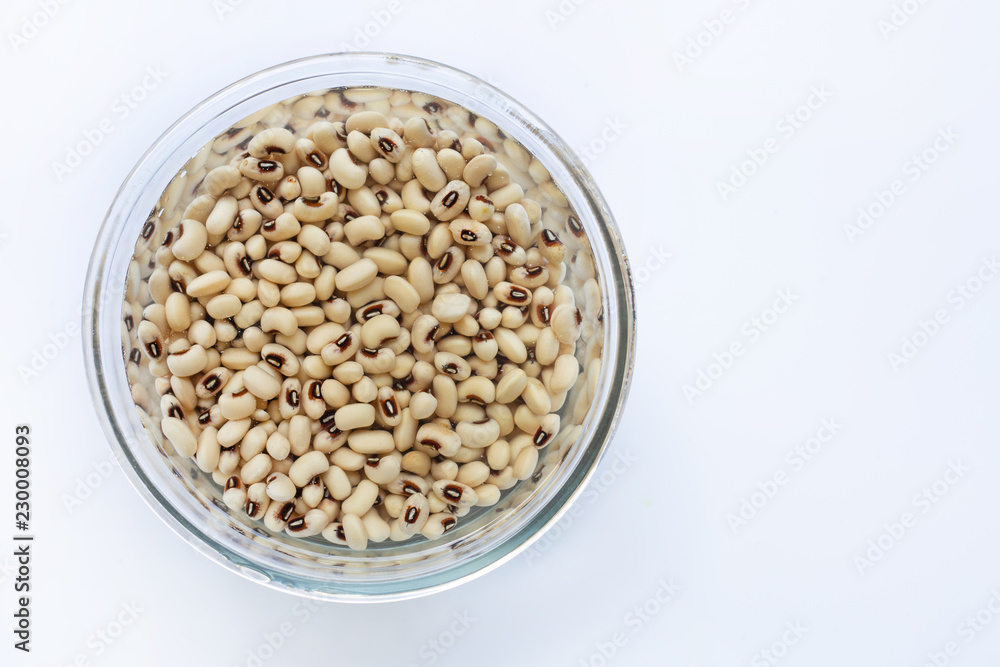 Black eyed beans soaked in water in glass bowl Black eyed beans soaked in water in glass bowl