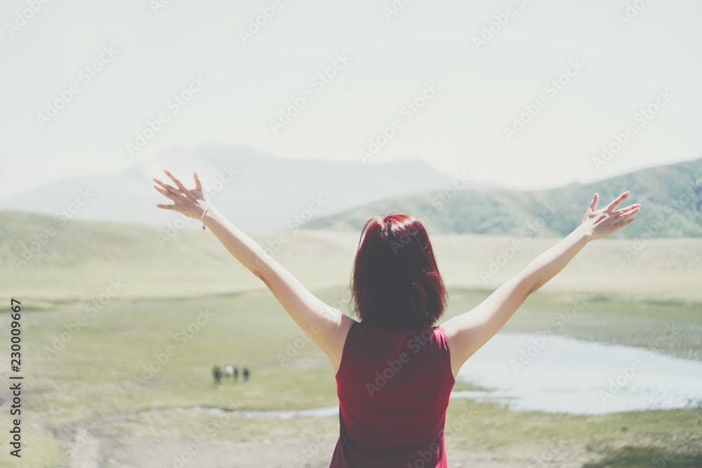 Man rise hands up to sky freedom concept with blue sky and summer beach background. Man rise hands up to sky freedom concept with blue sky and summer beach background.