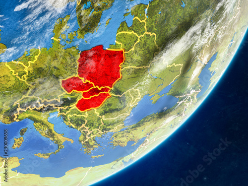 Visegrad Group on model of planet Earth with country borders and very detailed planet surface and clouds.