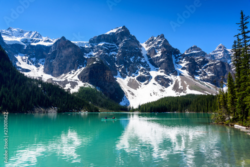 Beautiful turquoise water of the Moraine lake with snow-covered Valley of the Ten Peaks , rocky mountains in Banff National Park of Canada