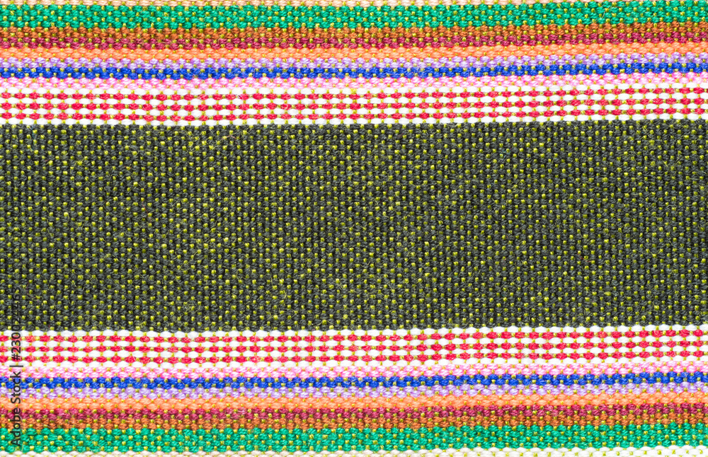 Handmade cotton woven fabric as a background and texture Handmade cotton woven fabric as a background and texture