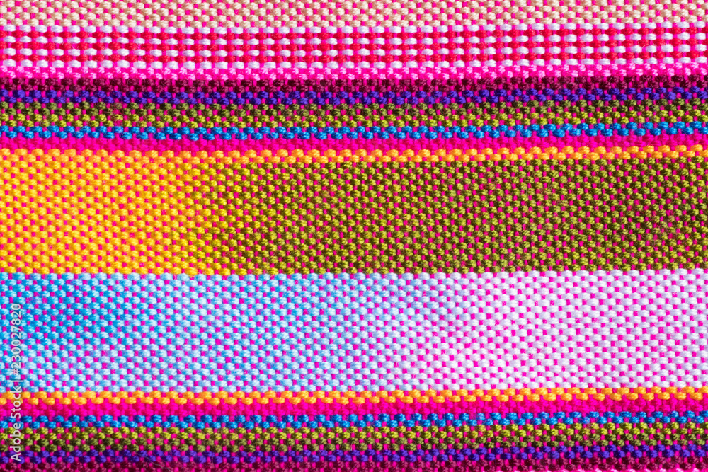 Handmade cotton woven fabric as a background and texture Handmade cotton woven fabric as a background and texture