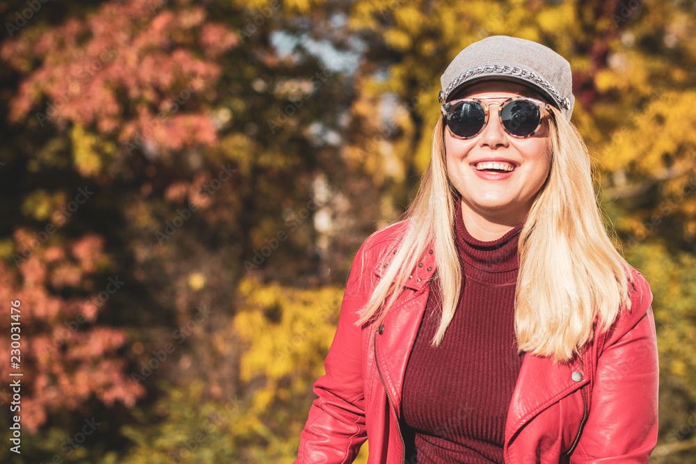 Fashionable plus size model at park, pretty look. Concept of fashion for big women. Lifestyle of modern lady in big city life. Ideas for ladies Fashionable plus size model at park, pretty look. Concept of fashion for big women. Lifestyle of modern lady in big city life. Ideas for ladies