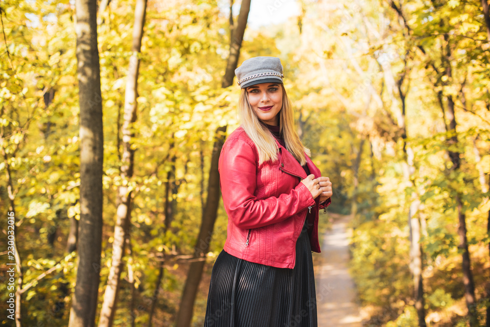 Fashionable plus size model at park, pretty look. Concept of fashion for big women. Lifestyle of modern lady in big city life. Ideas for ladies Fashionable plus size model at park, pretty look. Concept of fashion for big women. Lifestyle of modern lady in big city life. Ideas for ladies