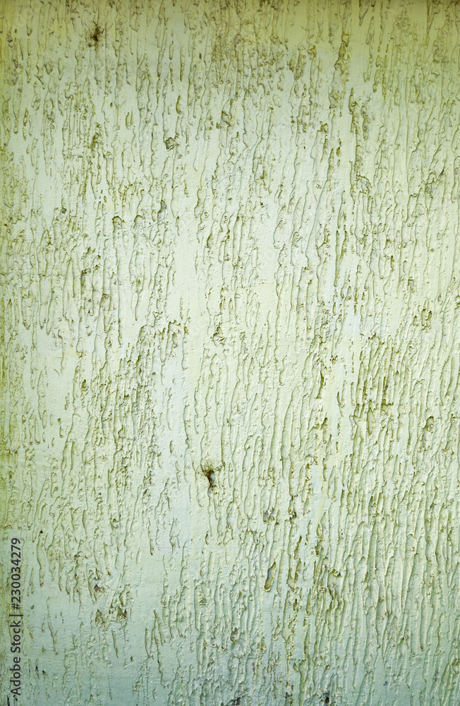 Fototapeta premium Abstract textured background: mixture of blue and green putty. Uneven strokes, rough texture of a wall pattern