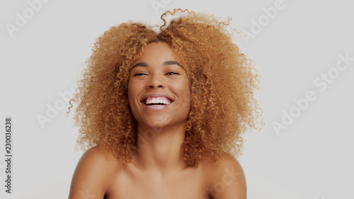 mixed race black blonde model with curly hair