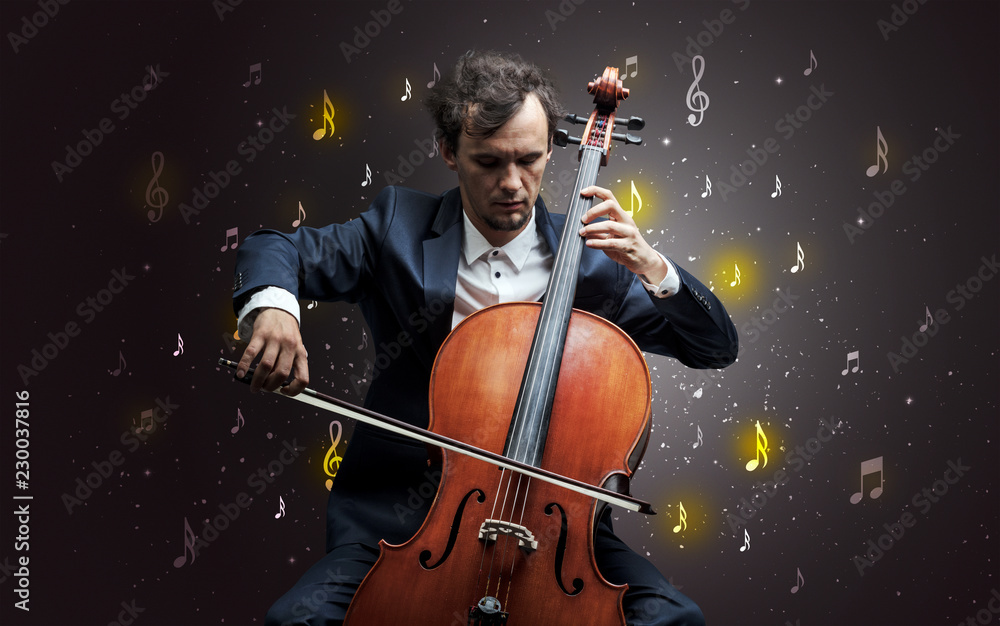 Fototapeta premium Young cellist with falling musical notes wallpaper and classical concept