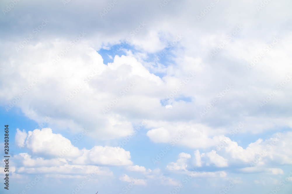 Blue sky background with tiny clouds.Cloudy blue sky abstract background. Blue sky background with tiny clouds.Cloudy blue sky abstract background.