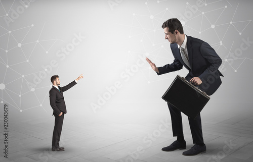 Small businessman aiming at a big businessman with connection and network concept 
