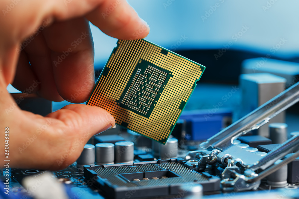 Electronic engineer of computer technology. Maintenance computer cpu hardware upgrade of motherboard component. Pc repair, technician and industry support.