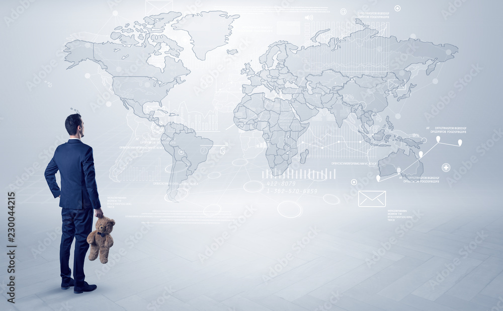 Businessman standing with his back and looking at a worldwide map with objects in his hand
Businessman standing with his back and looking at a worldwide map with objects in his hand