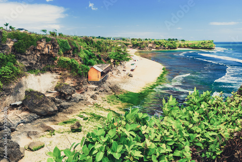 Azure beach with rocky mountains and clear water of Indian ocean at sunny day / A view of a cliff in Bali Indonesia / Bali, Indonesia © Konstantin