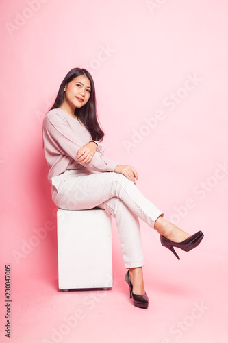 Beautiful young Asian woman in pink shirt © halfbottle