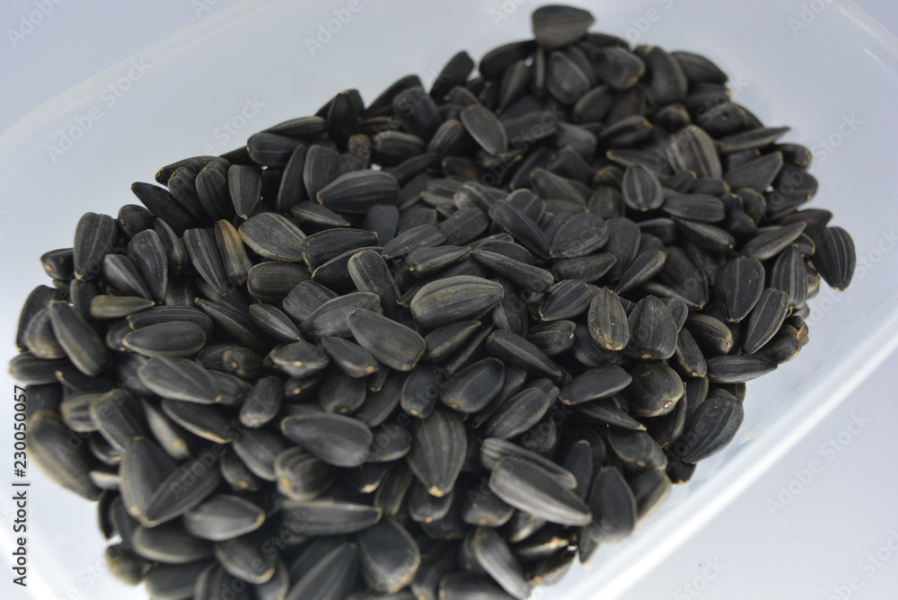 Black sunflower seeds, roasted, roasted sunflower seeds, sunflower seeds, natural and healthy food for people, tasty and pleasant Black sunflower seeds, roasted, roasted sunflower seeds, sunflower seeds, natural and healthy food for people, tasty and pleasant