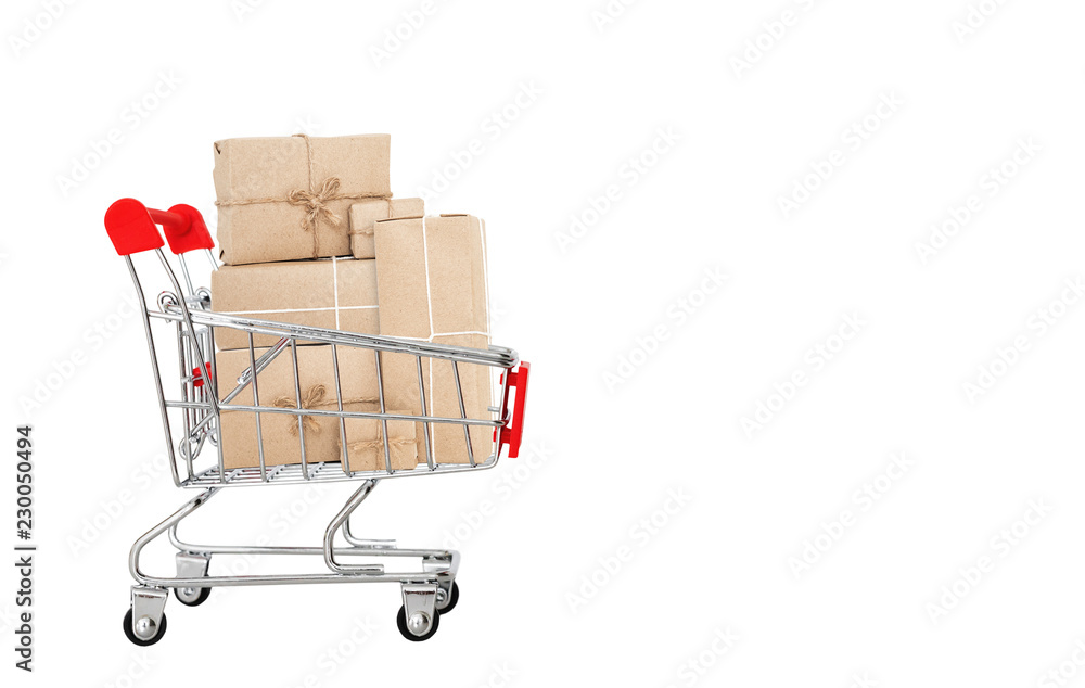 Shopping cart full of boxes, isolated on white background