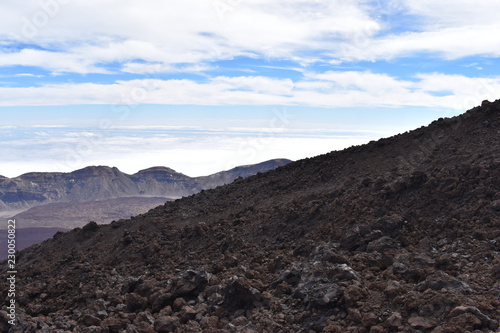 Big lava stones at the hiking trail to the big famous volcano Pico del Teide in Tenerife, Europe