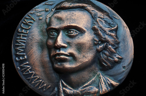Bronze medal of Mihai Eminescu, rare medal of Romanian national poet, Mihai Eminescu, created in 1989 in Moldavian Soviet Socialist Republic, now Moldova photo