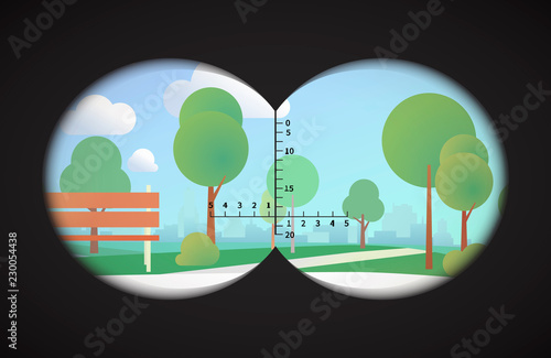 View from binoculars on landscape with park and cityline on background