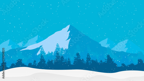 snowfall on the background of the winter forest and mountains
