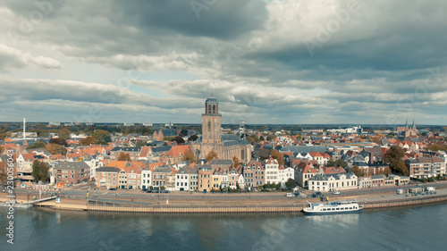 Aerial panoramic view of the Dutch medieval city of Deventer in The Netherlands seen from the other side of the river IJssel that passes it