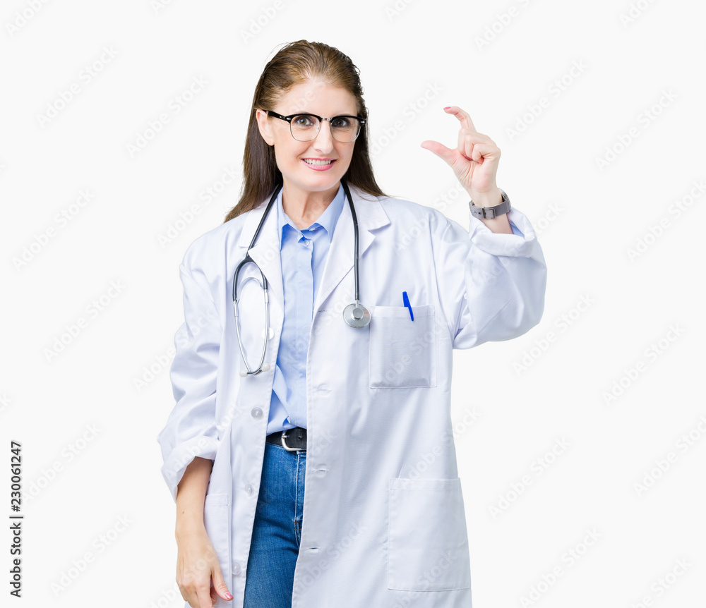 Middle age mature doctor woman wearing medical coat over isolated background smiling and confident gesturing with hand doing size sign with fingers while looking and the camera. Measure concept. Middle age mature doctor woman wearing medical coat over isolated background smiling and confident gesturing with hand doing size sign with fingers while looking and the camera. Measure concept.