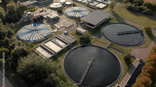 Water treatment facility in The Netherlands seen from above with various water tanks and adjacent buildings