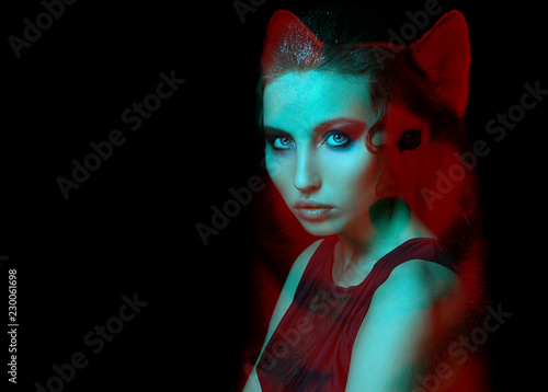 Gothic girl and wolf double exposure on black background. Werewolf concept. space for text photo