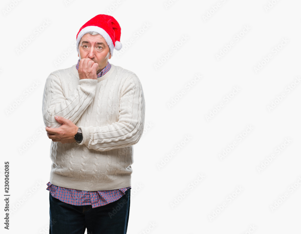 Handsome senior man wearing christmas hat over isolated background looking stressed and nervous with hands on mouth biting nails. Anxiety problem. Handsome senior man wearing christmas hat over isolated background looking stressed and nervous with hands on mouth biting nails. Anxiety problem.