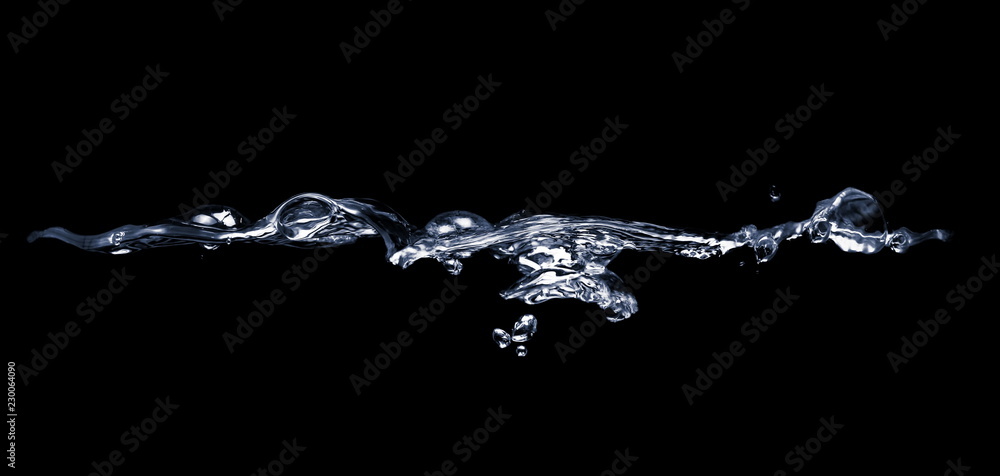 water splash with drops isolated on black background