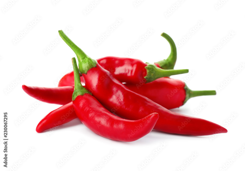 Heap of red chili peppers on white background