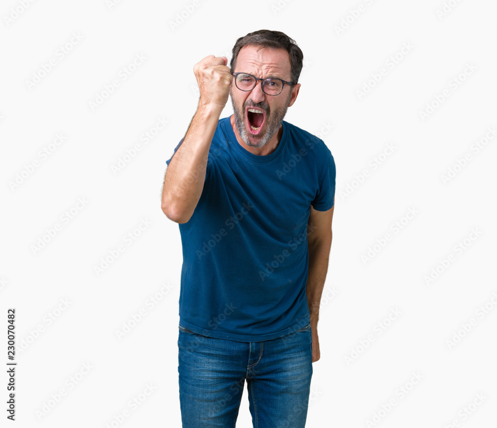 Handsome middle age hoary senior man wearin glasses over isolated background angry and mad raising fist frustrated and furious while shouting with anger. Rage and aggressive concept. Handsome middle age hoary senior man wearin glasses over isolated background angry and mad raising fist frustrated and furious while shouting with anger. Rage and aggressive concept.