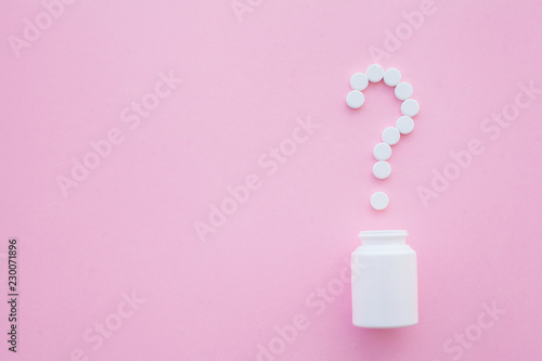 Close up of pills. Dietary supplements. Variety pills. Vitamin capsules on pink background © Maksymiv Iurii
